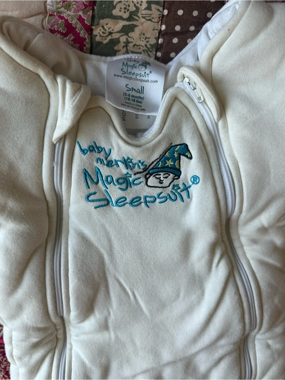 Baby Merlin’s Magic Sleepsuit Baby Onesie - Cream light yellow